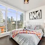 Luxurious 2-Bedroom Retreat With Panoramic Cityscape
