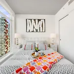 Luxurious 2-Bedroom Retreat With Panoramic Cityscape