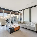 Modern High-Rise Retreat With Stunning City Access
