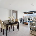Modern High-Rise Retreat With Stunning City Access